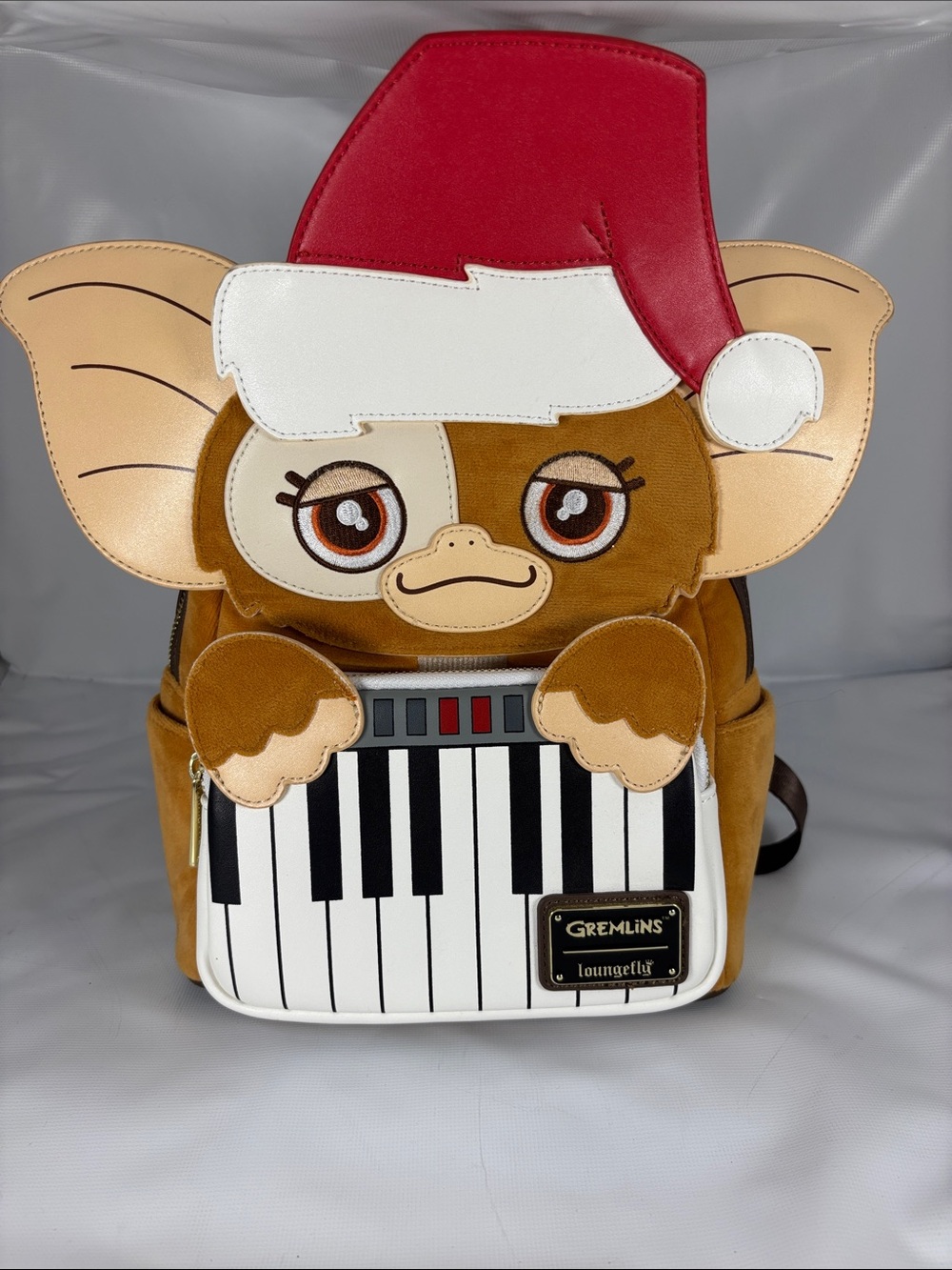 Loungefly Brown, Red, White Gizmo Piano Holiday Mini Backpack